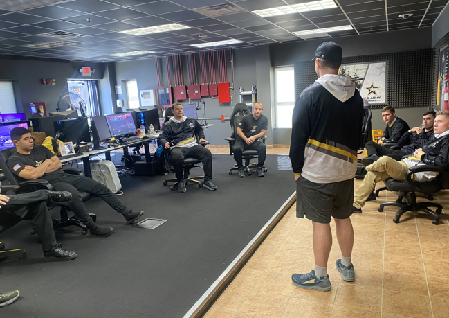 Peran coach e-sport